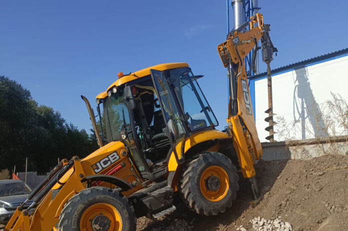 Экскаватор-погрузчик New Holland B115B
